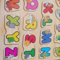English Alphabet Wood Peg Puzzle. 