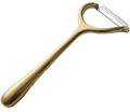 golden potato peeler and vegetable grater. 