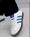 Adidas Samba OG Shoes: Classic White with Blue Stripes. 