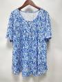 Plus-size spring-summer short-sleeved T-shirt with randomly printed buttons. 