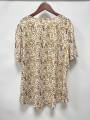 Plus-size spring-summer short-sleeved T-shirt with randomly printed buttons. 