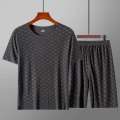 Men's Hot Selling Summer Printed Ice Silk Home Suit Set, Tencel Casual Silk Smooth and Cool Sleepwear Short Sleeved Shorts Set.