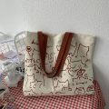 2026 Canvas Bag Womens Handbag Shopping Bag Cute Cat Zipper Handbag Designer Bag Japanese Style Cartoon Small Shoulder Bag. 