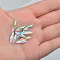 JUNAO 100pcs 4*15mm Crystal AB Nail Rhinestone Flatback Strass Crystal Horse Eye Resin Stone Applique Face Nail Art Decoration.