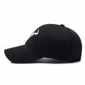 Stylish Black Baseball Cap with Unique White Bull - horn - like Logo, Ideal for Everyday Wear and Outdoor Activities. 