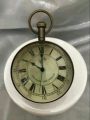 (H).  VTG Brass Eye of Time Per Mare Per Terram By Land Watch
  Brass Table clock Nautical shelf & desk clock. 