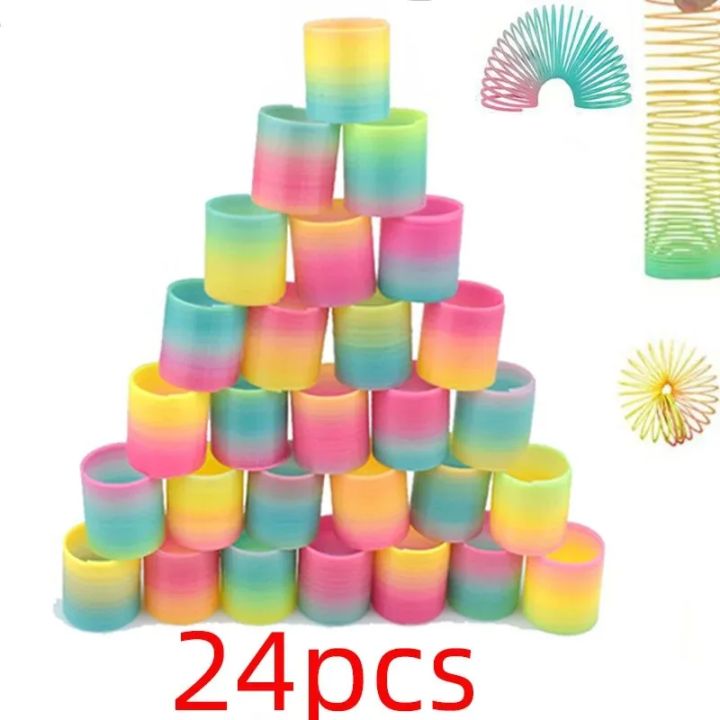 24PCS Rainbow Magic Springs Circle Toys Kids Birthday Party Favors Guests Giveaway Small s Pinata Fillers Flexible Funny Toy