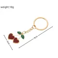 Cute Red Enamel Cherry Pendant Keychain for Women Girls Lovely Gold Color Fruit Keyring Keys Holder for Backpack Bag Gifts. 
