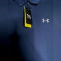 Under Armour Dri fit polo with reflected logo in
Navy Blue colour. 