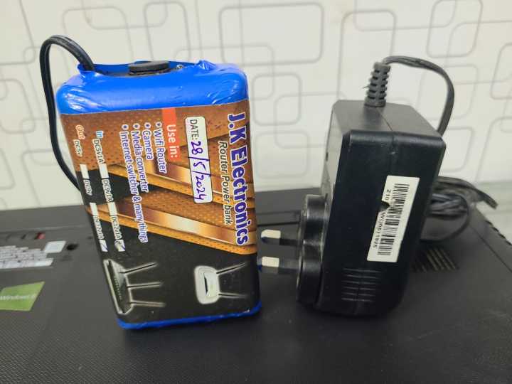 Router%20Power%20bank%2012%20Volt%2012%20Volt%20fiber%20router%20power%20bank%20Ups%20power%20bank%20Router%20Huawei%20Router%20Tp-link%20D-link%20Ptcl%20%20Tenda%20Huawei%20Router%2012%20volt%20Net%20device%20power%20bank%20With%20Free%20Branded%20Charger%20-%20Image%204