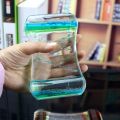 Creative Oil Drop Sliding Dual Color Liquid Water Oil Drop Hourglass Sports Bubble Decompression Toy Timer Desktop Decoration. 