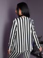 Black and white striped women's suit Jacket Niche 2024 Spring new holiday party high-end suit jacket Women's casual loose coat. 
