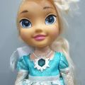 (B). Disney Frozen Snow Glow Elsa Doll Sings "Let it Go" Lights Up 13". 