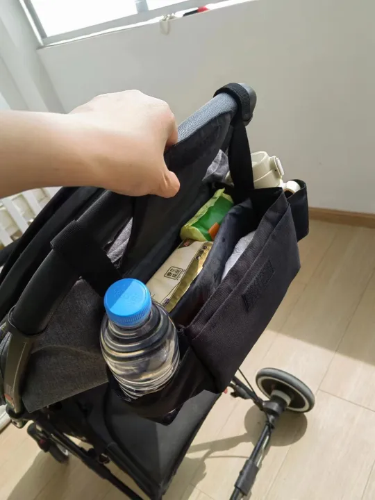 Baby%20stroller%20hanging%20bag%20cartoon%20bear%20storage%20bag%20Stroller%20basket%20hanging%20bag%20baby%20roller%20-%20Image%204