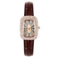 Women's Analog Watch with Diamond Studded Bezel and Black Leather Strap. 