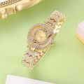 Rhinestones Butterfly Gold Analog Women Watch. 