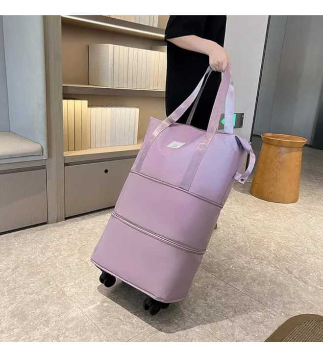 Rolling%20Duffle%20Bag%20with%20Wheels%20Expandable%20Foldable%20Duffle%20Bag%20with%20Wheels%20and%20Handle%20for%20Travel%20%20Rolling%20Luggage%20Bag%20Carry%20on%20Duffel%20Bag%20Wheeled%20Travel%20Duffle%20Bag%20-%20Image%206