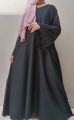 black colour imported nida fabric latest abaya with premium quality nug work on sleeves and front. 