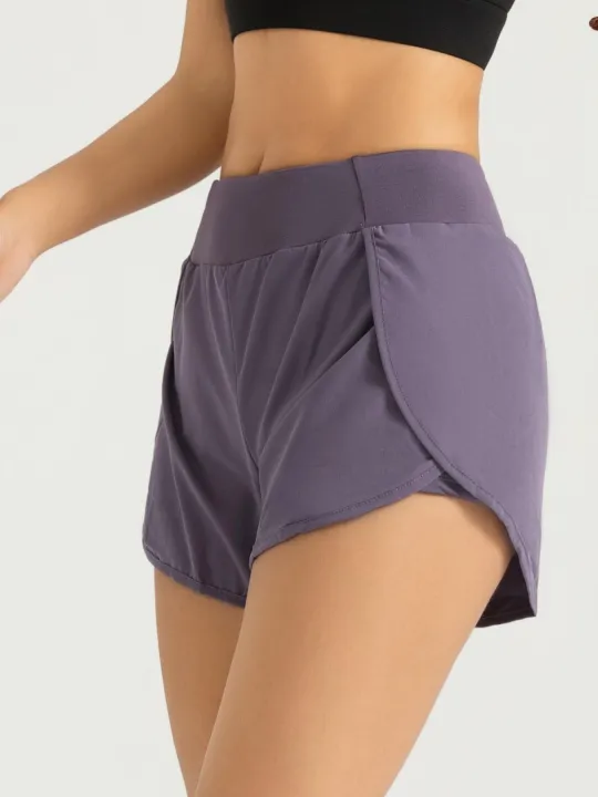 Women's%20Lightweight%20Running%20Shorts%20with%20Pockets%20and%20Liner,%20High%20Waist%20Design%20with%20Moisture-Wicking%20Technology%20for%20Comfort%20-%20Image%204