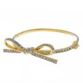 (C). Kate Spade Bow Bangle Bracelet. 