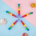 7 Color Crayons Cartoon Smiley Face. 