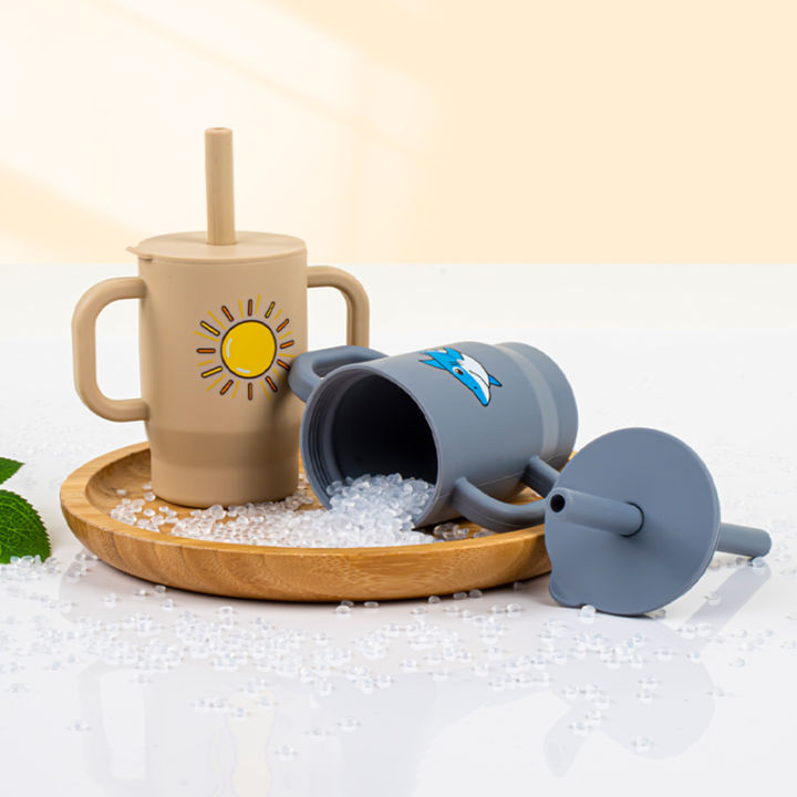 Silicone%20180ml%20Baby%20Learning%20Drinking%20Cup%20with%20Handle%20and%20Straw%20Training%20Cup,%20Cartoon%20Printed%20Leak-Proof%20Baby%20Water%20Cup%20-%20Image%204