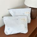 Light Blue Striped Bow Cosmetic Bag, Women Travel Makeup Organizer with Zipper, Multi-Use Toiletry Pouch. 