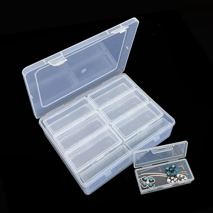 A%20plastic%20storage%20box%20with%2012/14%20adjustable%20dividers%20-%20suitable%20for%20storing%20jewelry,%20DIY%20crafts,%20small%20tools,%20and%20some%20candies%20-%20Image%204