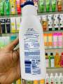 Nivea Body Lotion Extra Whitening Cell Repair & UV Protect SPF 15 400ml ALL SKIN TYPE. 