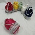 traditional potli gol bag clutch with silver lace. 