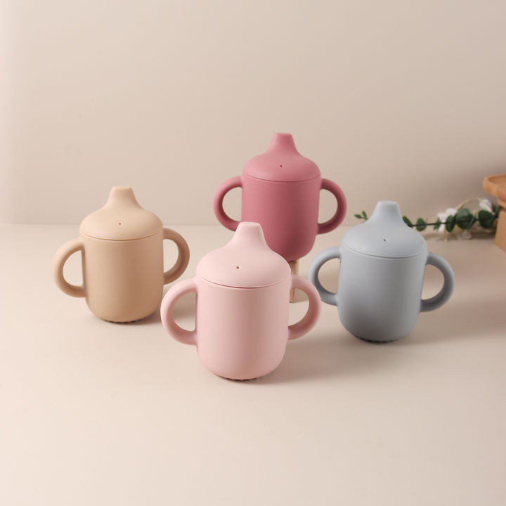 New%20solid%20180ML%20Baby%20Silicone%20Sippy%20Cup%20BPA-Free%20Portable%20Feeding%20Cup%20Portable%20Learning%20Hand%20Shank%20Drinking%20Water%20training%20Cups%20-%20Image%204