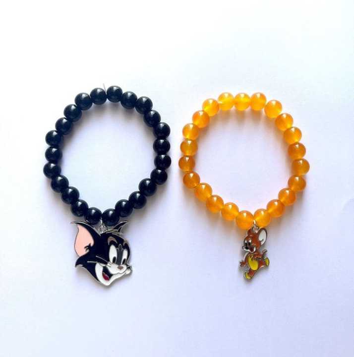 pack of 1 pair. tom and Jerry charm bracelet. /duo / friendship  / cartoon / unisex / couple bracelet. customize handmade jewelry accessories. cartoon character jewelry. 8MM glass beads black, white and brown color.