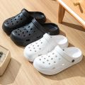 New EVA summer ladies sandals New soft beach men's slippers Outdoor non-slip waterproof cave slippers Couple leisure slippers.