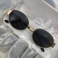 Unisex Metal Summer Sunglasses for Men and Women - Retro Oval Fashion Style with Gold Frame.