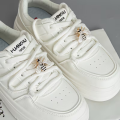 A Pair of Detachable Cute Little Bee-Style White-Winged Shoes with Glittery Decorations on the Laces and the Buckle.. 