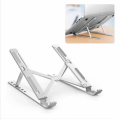 Ergonomic Foldable Laptop Stand Holder - for Any Windows Laptop, MacBook, iPad & Android Tablets SMT. 