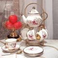 13 Pcs Tea Set original bone china Tea set with golden stand. 