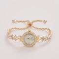 1 piece of elegant women's quartz watch, paired with luxurious rhinestone embellishment - gold simulated bracelet.
