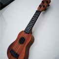Mini Guitar 4 Strings Classical Ukulele Guitar Toy Musical Instruments For Kids Beginners Early Education Ukulele.