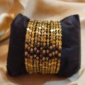 Golden Alloy 12 Piece Bangles Set  for women/girls(jewellery). 