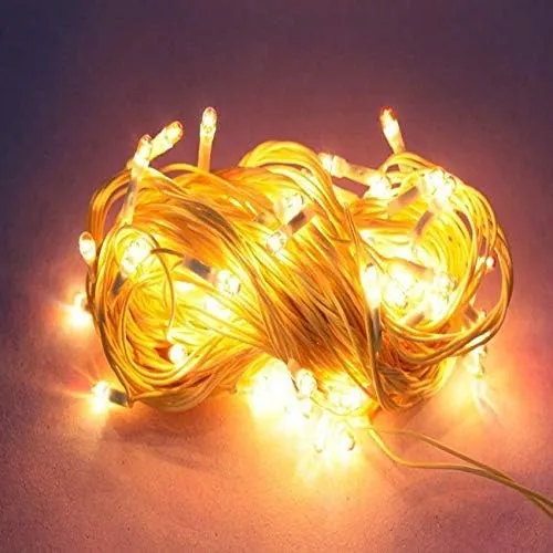 fairy%20lights%2015%20feet%20size%20String%20Lights%20golden%20colour,%20silver.green.blue.%20red%20many%20colors%20Christmas%20Lights%20Indoor%20Clear%20Wire,%20IP65%20Warm%20Fairy%20Lights%20for%20Outdoor%20Indoor%20Bedroom%20Garden%20Christmas%20Tree%20Wedding(golden)%20-%20Image%204