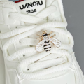 A Pair of Detachable Cute Little Bee-Style White-Winged Shoes with Glittery Decorations on the Laces and the Buckle.. 