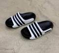 New Original Adidas Classic Black & White Triple-Line Slides – Trendy Casual Slip-On Sandals for Men & Women | Lightweight, Comfortable & Stylish Footwear. 