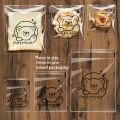 100pcs 3 In 1 Cute Cartoon Self-Sealing Baking Bags - Transparent & Versatile for Bread, Biscuits, and Pastries. 