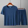 Men's Hot Selling Summer Printed Ice Silk Home Suit Set, Tencel Casual Silk Smooth and Cool Sleepwear Short Sleeved Shorts Set.