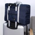 Lightweight Foldable Travel Duffel Bag: Unisex Tote Carry-On Luggage for Weekenders & Overnight Stays.