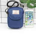Simple men's crossbody bag in solid color multi-layer zipper nylon single shoulder mobile phone bag daily wallet replacement.