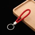 Very cheap 10 colors PU leather fashion keychain woven leather rope keychain bag hanging keychain. 