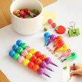 7 Color Crayons Cartoon Smiley Face. 