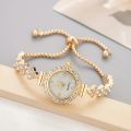1 piece of elegant women's quartz watch, paired with luxurious rhinestone embellishment - gold simulated bracelet.
